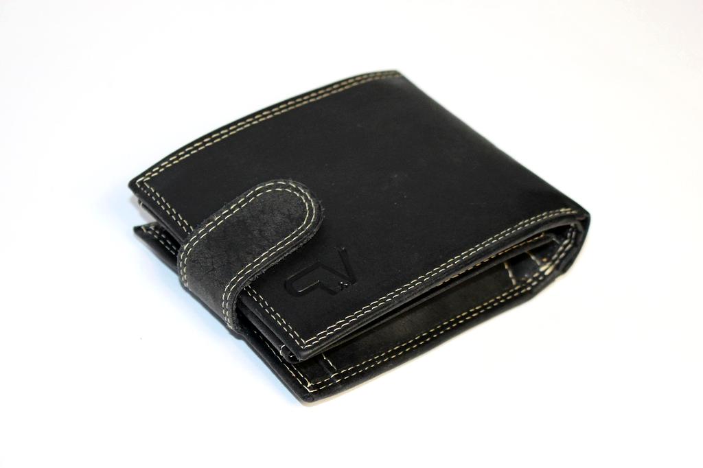 Stylish leather wallet on wooden table